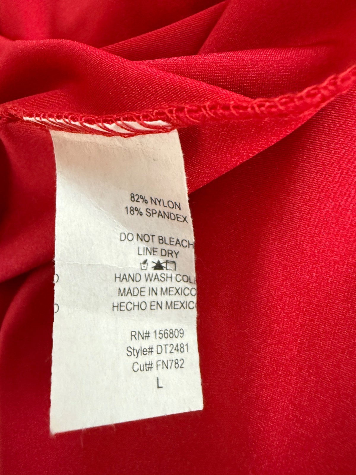 Red Sleeveless Plunging V-Neck Gown With Side Slit & Back Zipper Closure