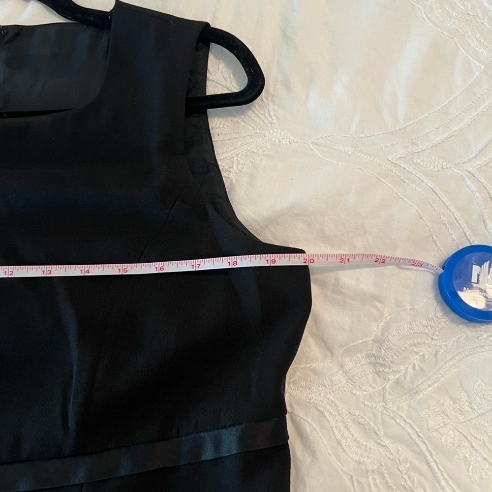 Patrick Collection Sleeveless Black dress with Satin Bow detail at waist size 10