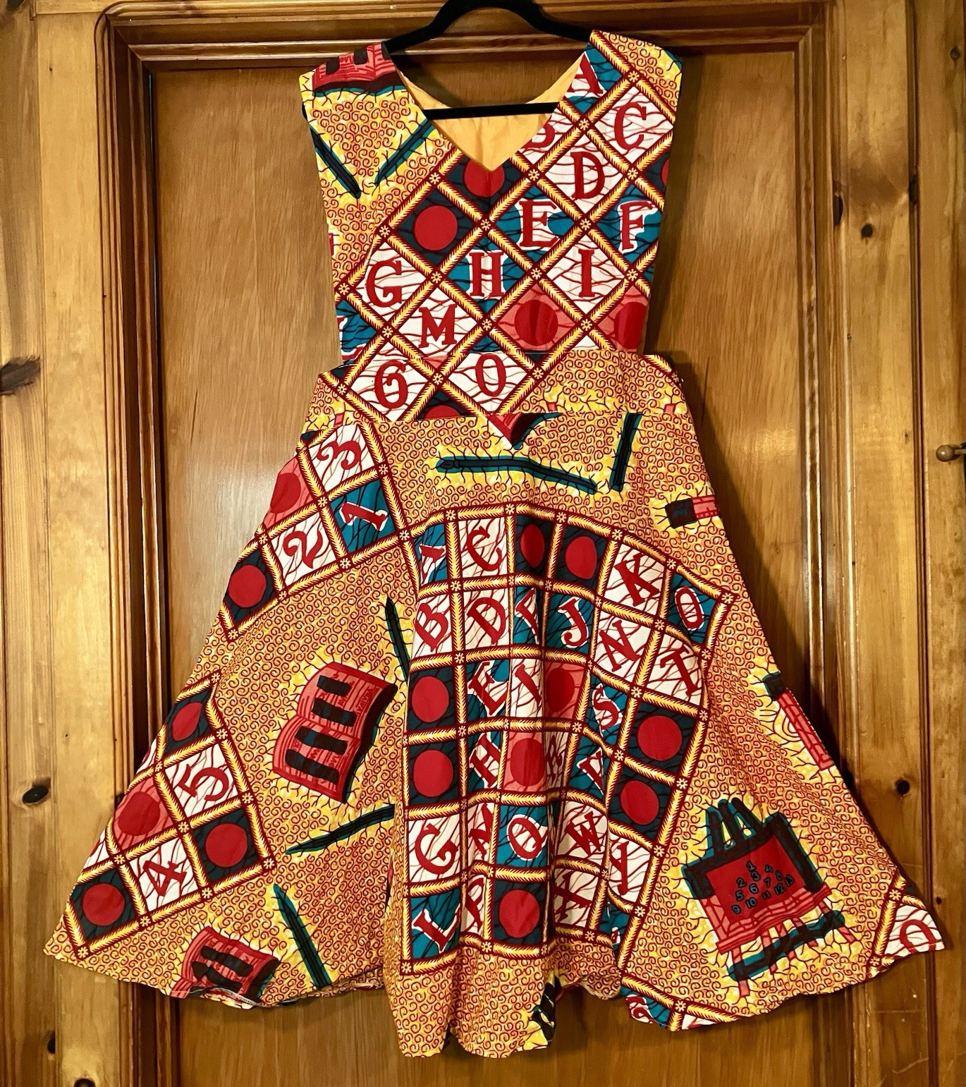 Artisanal African Wax Print Alphabet Motif Jumper Dress