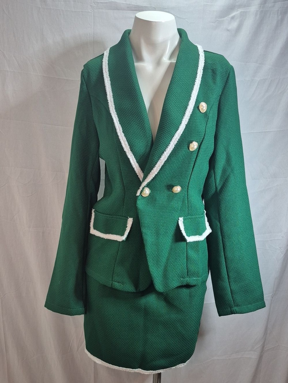 Green Two-Piece Skirt Suit with White Trim and Pearl Buttons