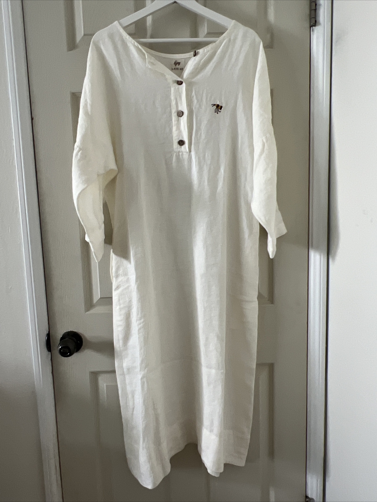 La Petite Alice Helen Dress with functional buttons in the front in White linen