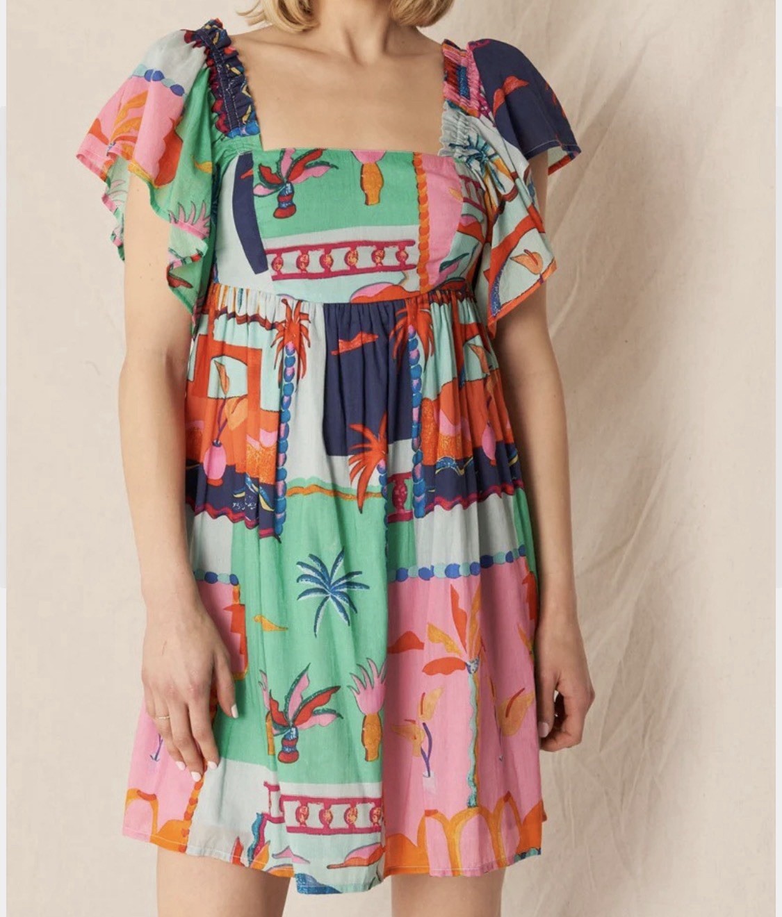 en creme Multi-color Tropical Print dress