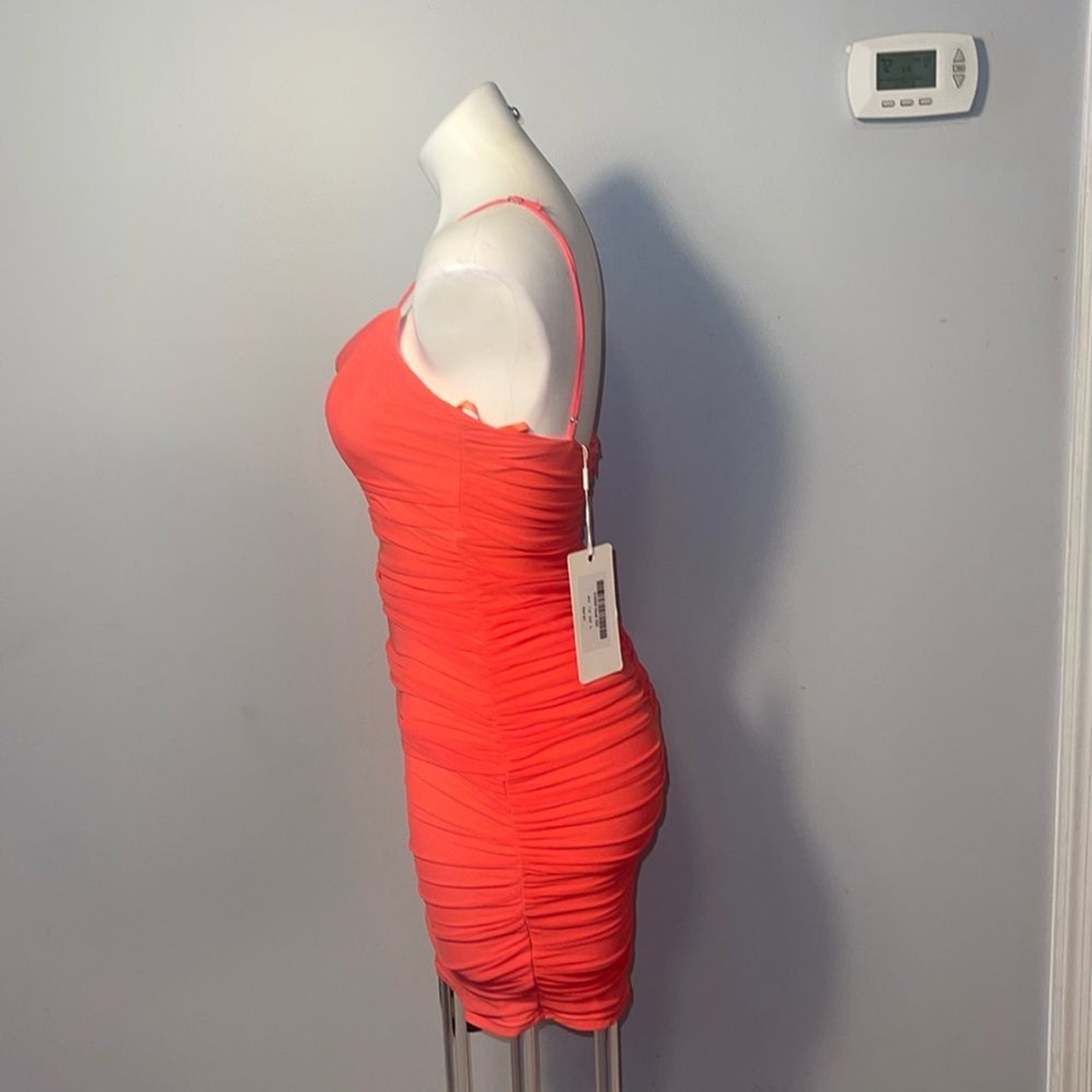 Saints + Secrets ladies Coral Ruched Mini Dress. Size large.