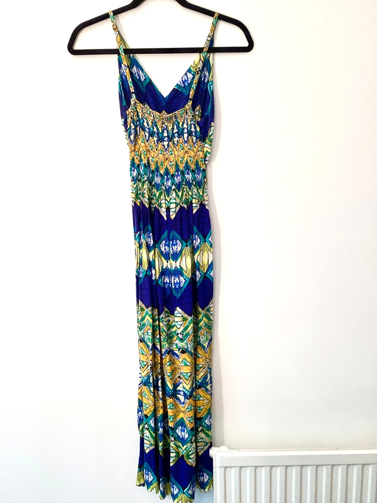 Stunning blue maxi dress featuring a vibrant geometric Aztec