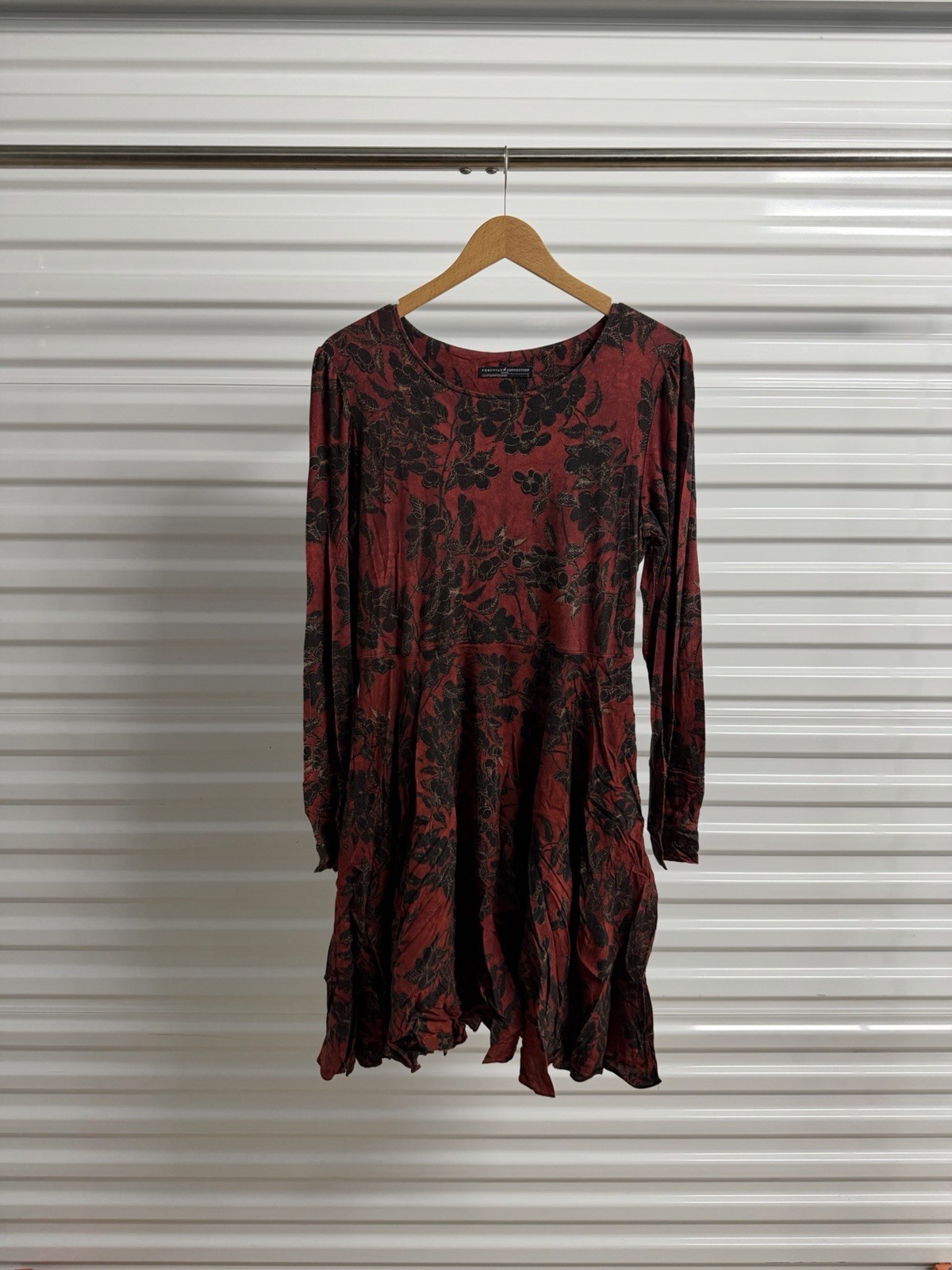 Peruvian Connection dress, featuring a red and black floral print