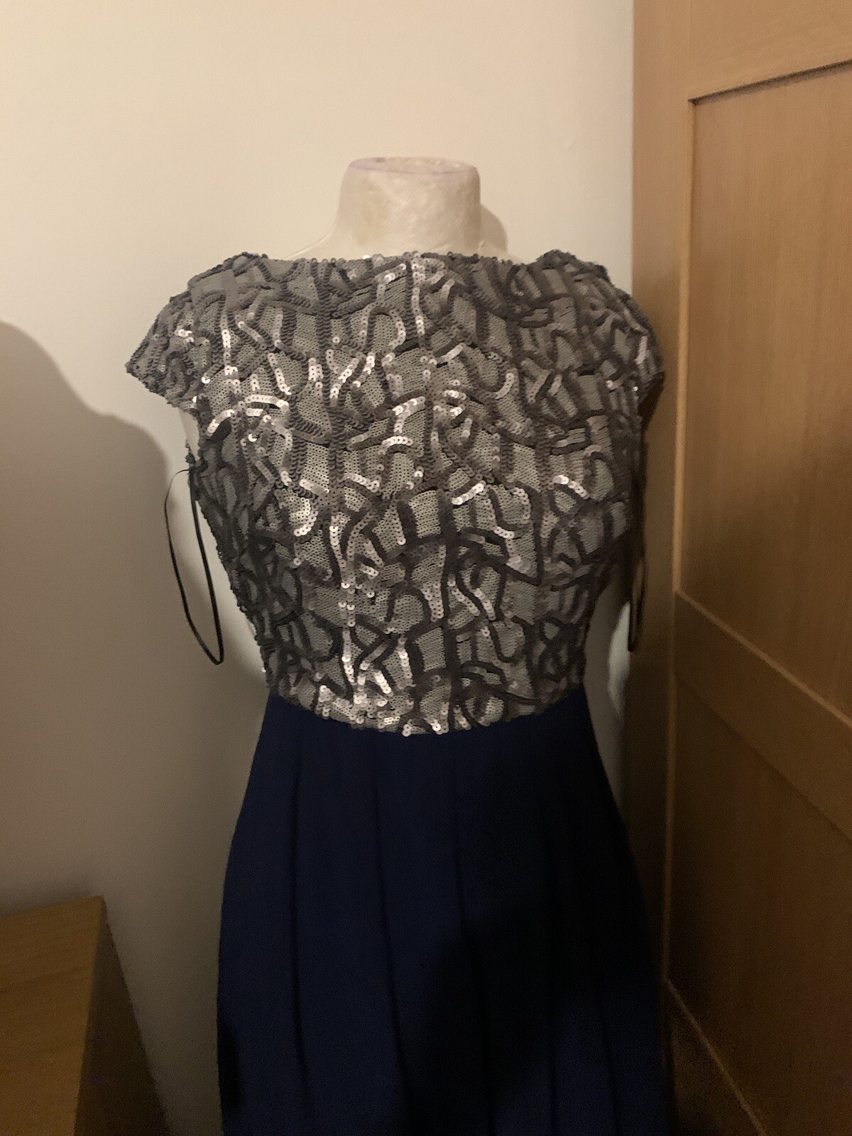 Little Mistress Maxi Dress with hand embellished silver sequins. low cut back.