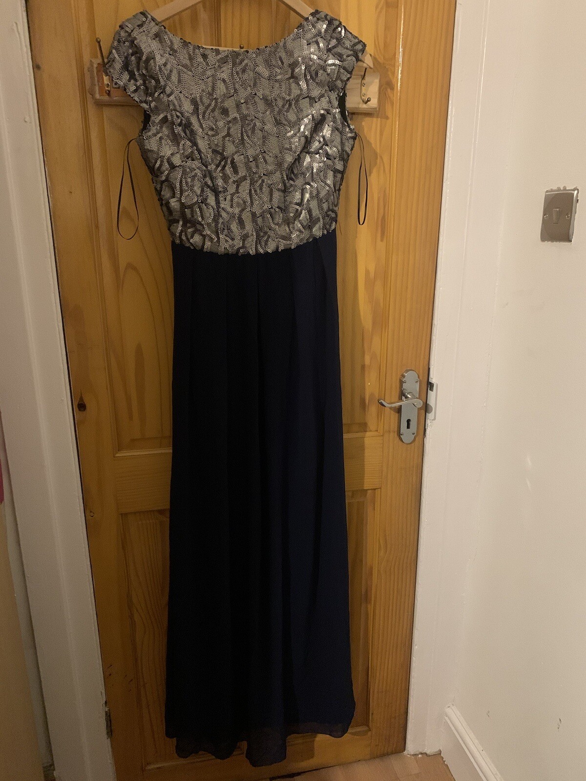 Little Mistress Maxi Dress with hand embellished silver sequins. low cut back.