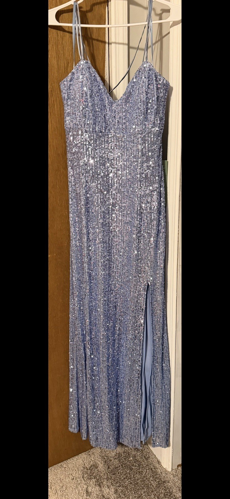 NWT Blue sequin spaghetti strap V-neckline low back, and a high slit Never worn