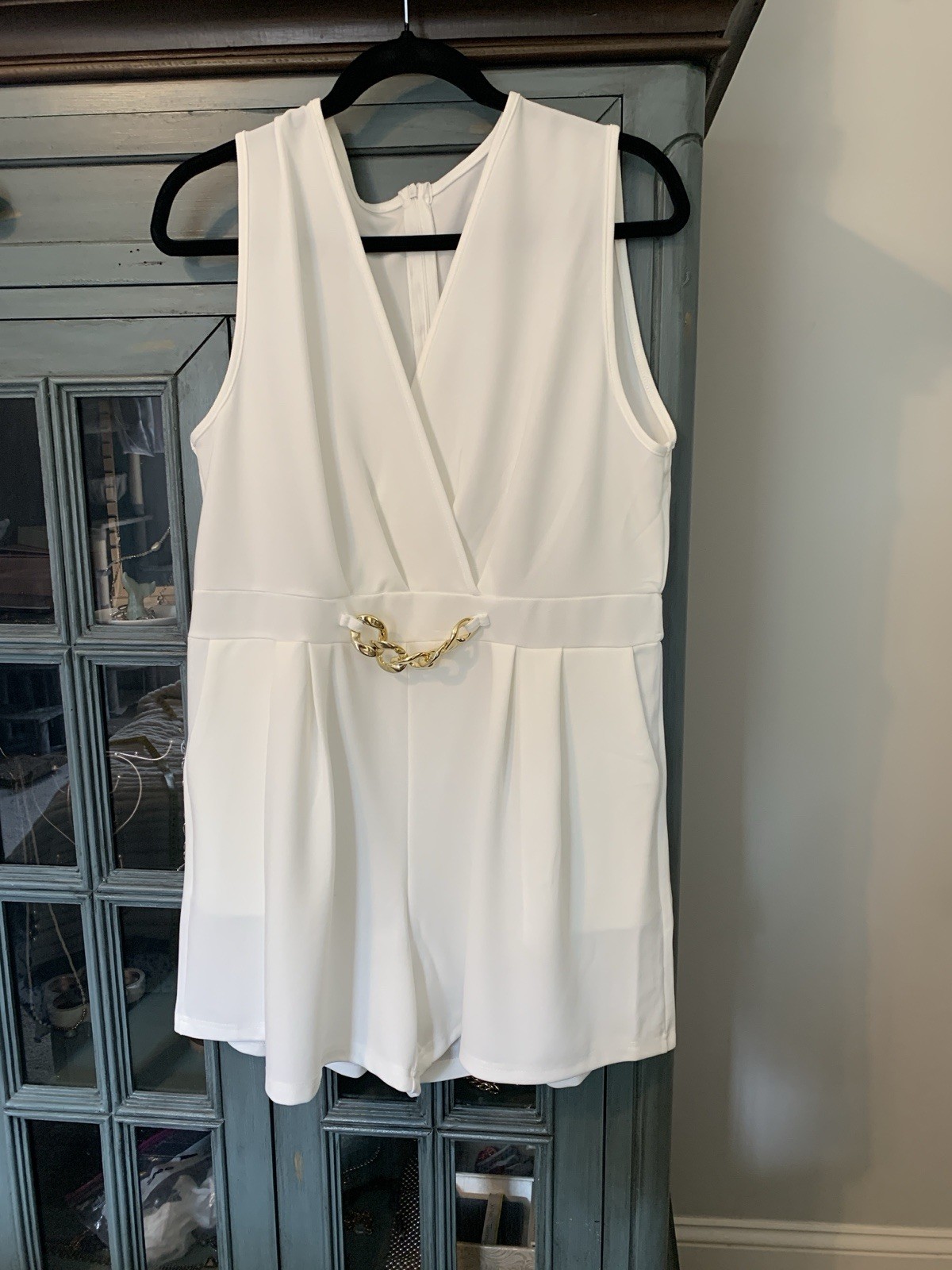 White Romper With gold Embellishment Size L zip up back.