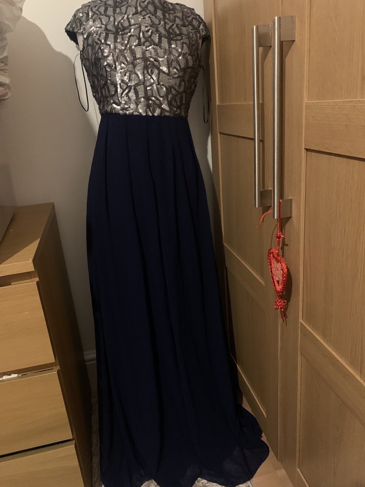 Little Mistress Maxi Dress with hand embellished silver sequins. low cut back.
