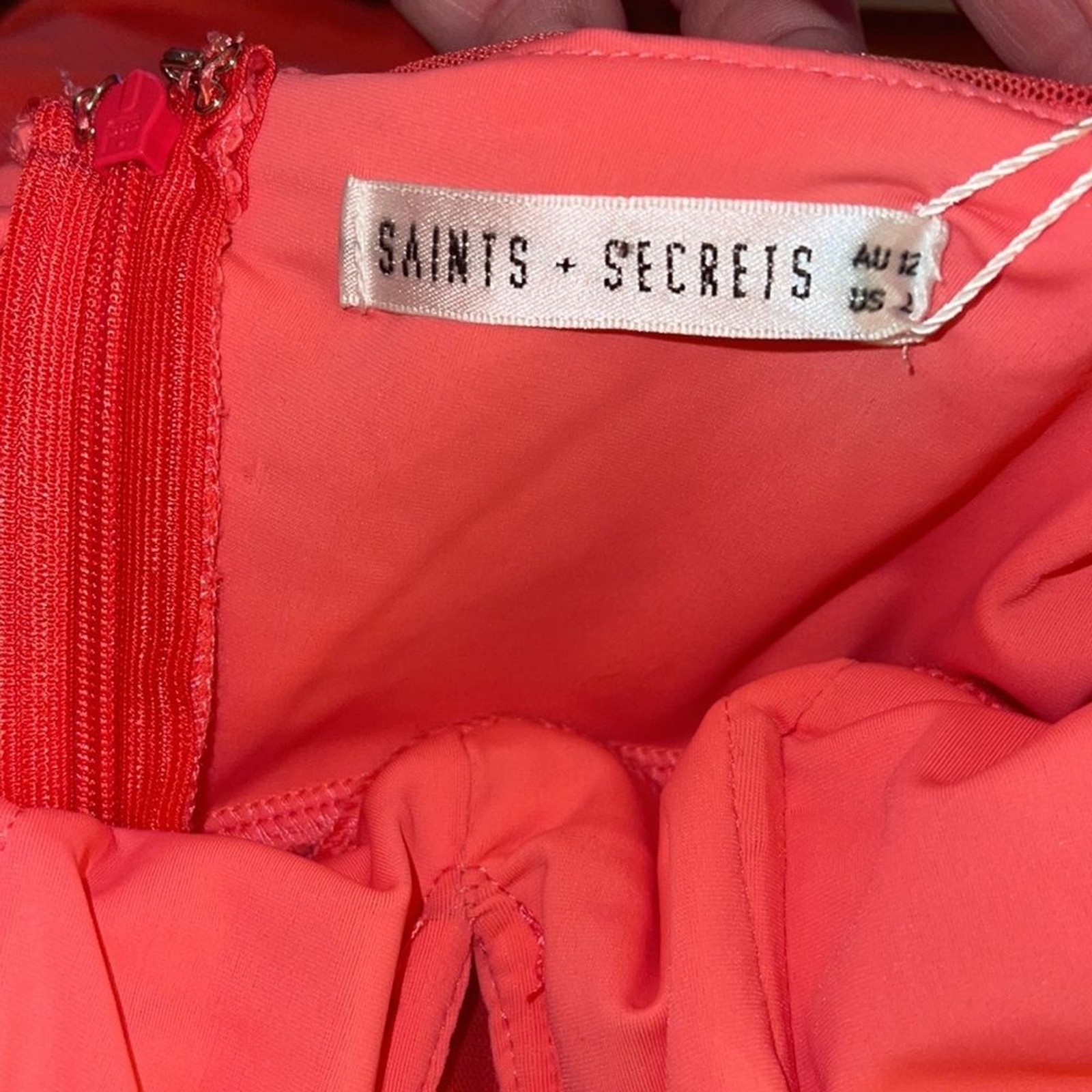 Saints + Secrets ladies Coral Ruched Mini Dress. Size large.