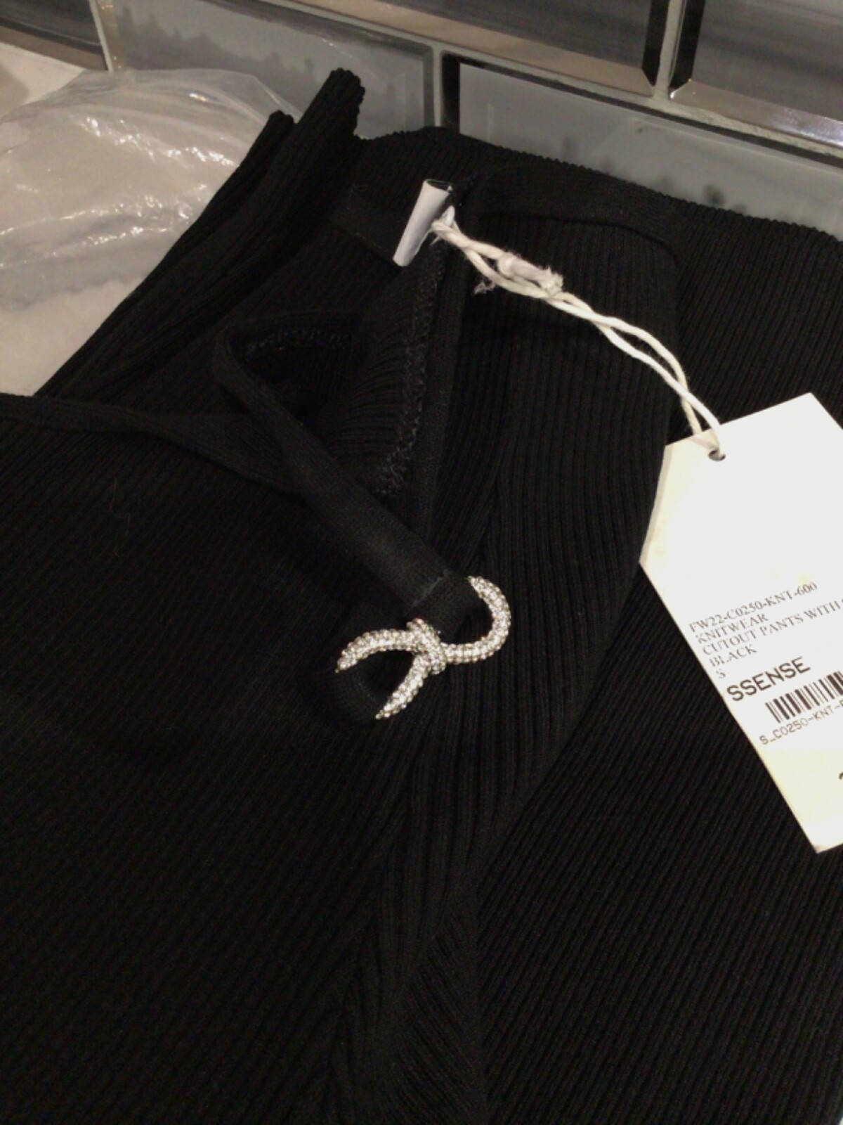 MACH&MACH Black Bow Trousers knit trousers. Cutout and crystal bow accent Size S