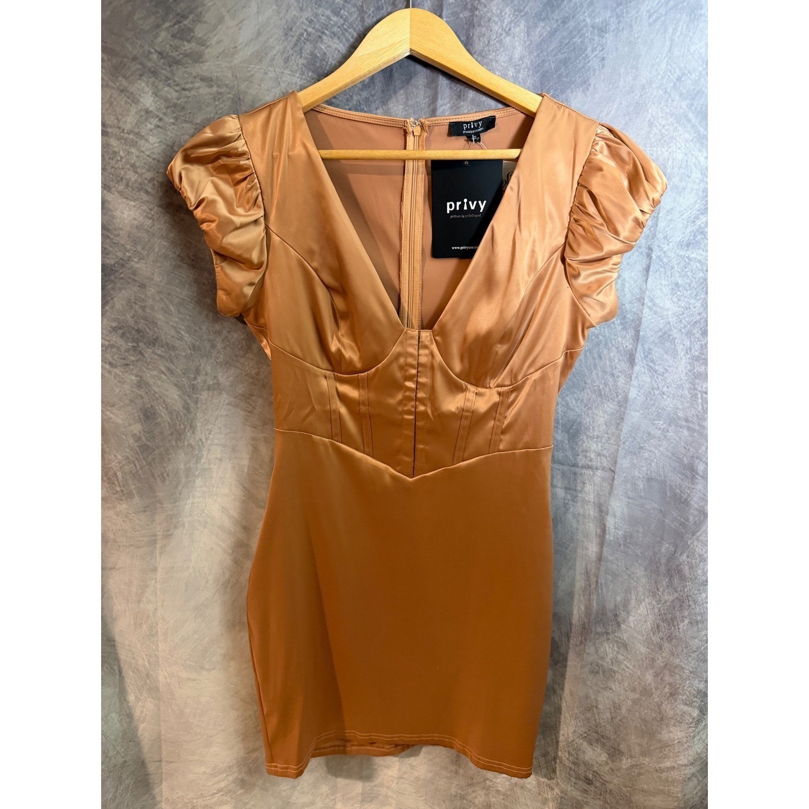 Sleek bronze satin mini dress, glamorous puff-sleeve elegance