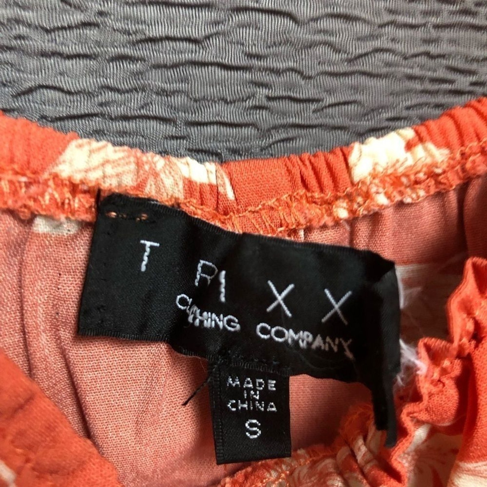 Trixx Small orange floral peasant type dress pull over buttons on front