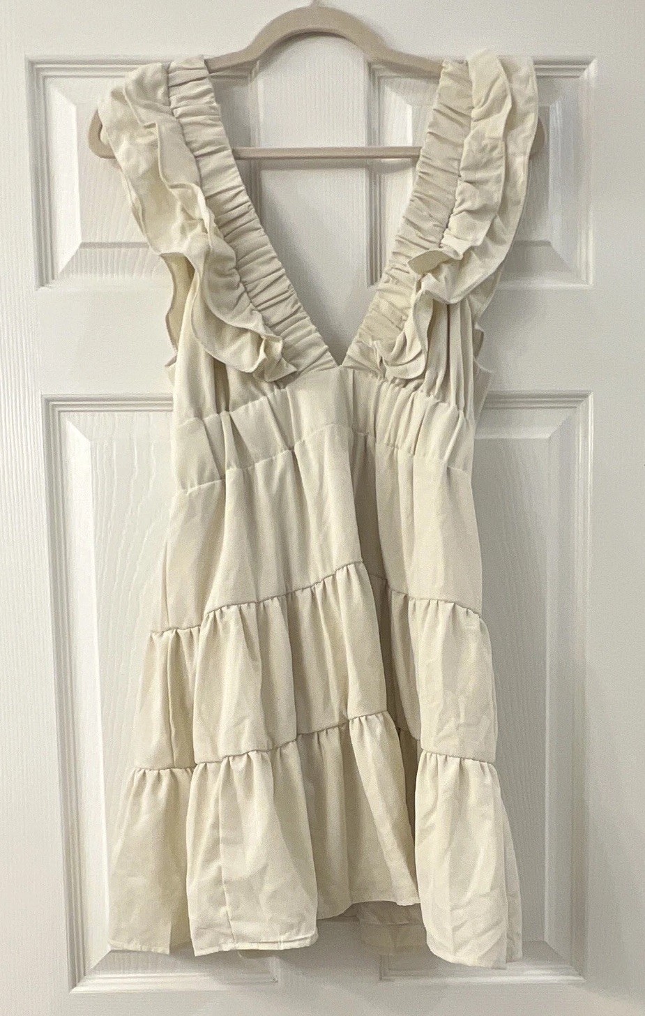 Small White Solid Ruffle Strap Tiered V-Neck Mini Dress Sleeveless & is lined.