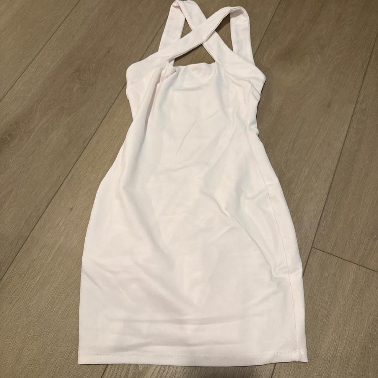 Nookie baby pink bodycon mini dress with cut out detail cross neck