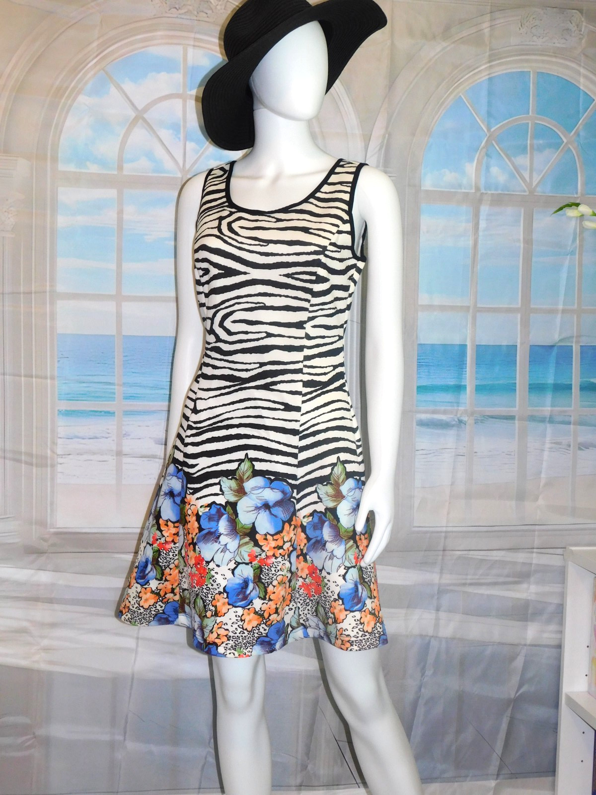 MILANO fit and flair sleeveless dress Zebra floral pattern 97% Poly 3% Spandex