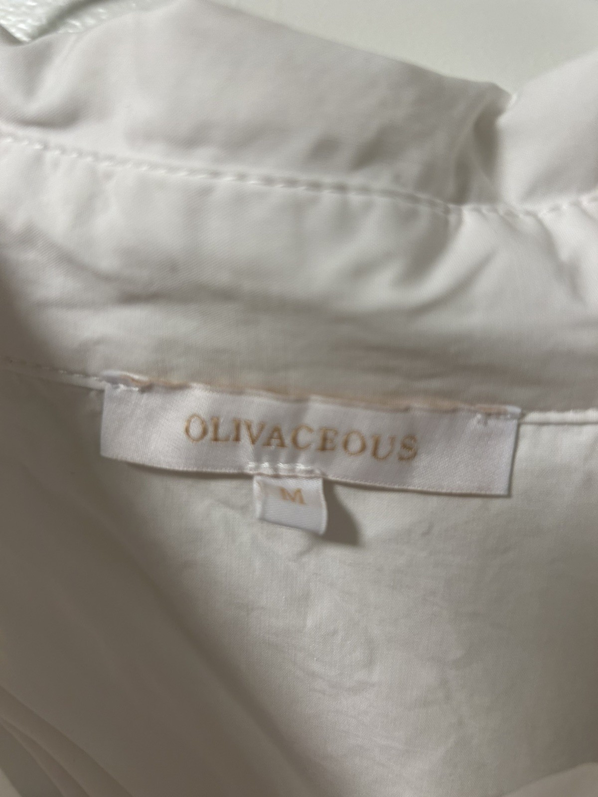 Olivaceous White Mini Size M with pockets cute open crisscross back