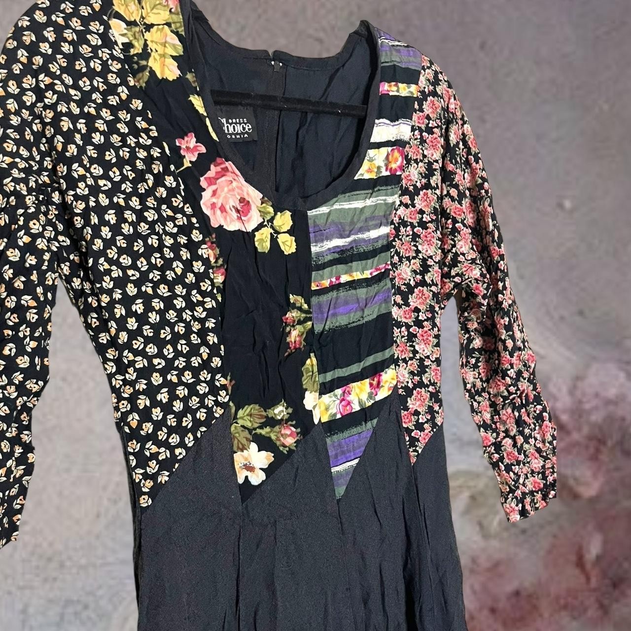 Black and multi-coloured floral patchwork midi dress. 3/4 sleeve. Zips in back