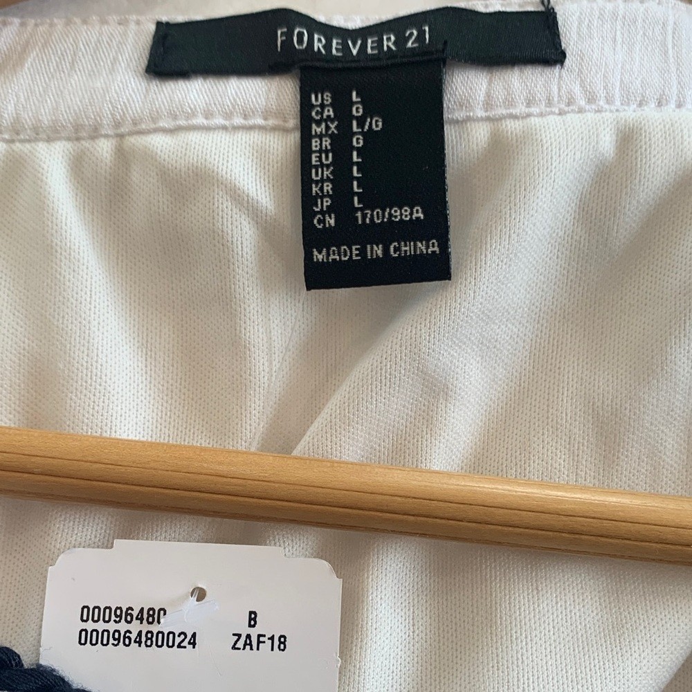 Forever 21 dress sleeveless white with dark navy embroidery Size Large