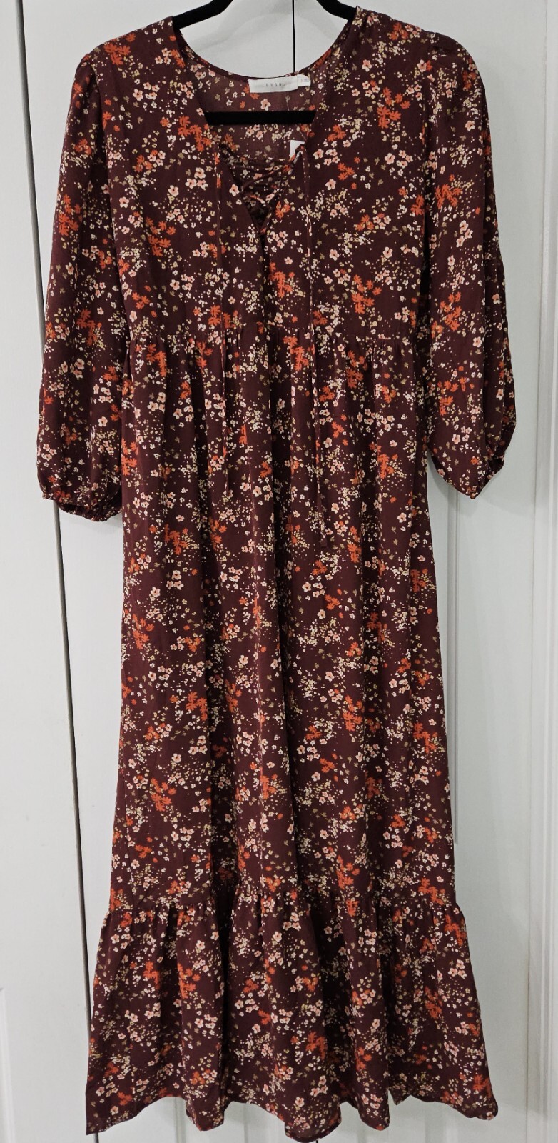 “Lush ” 3/4 puff sleeve, ruffle hem, maxi dress with tie front at v-neck S NWT