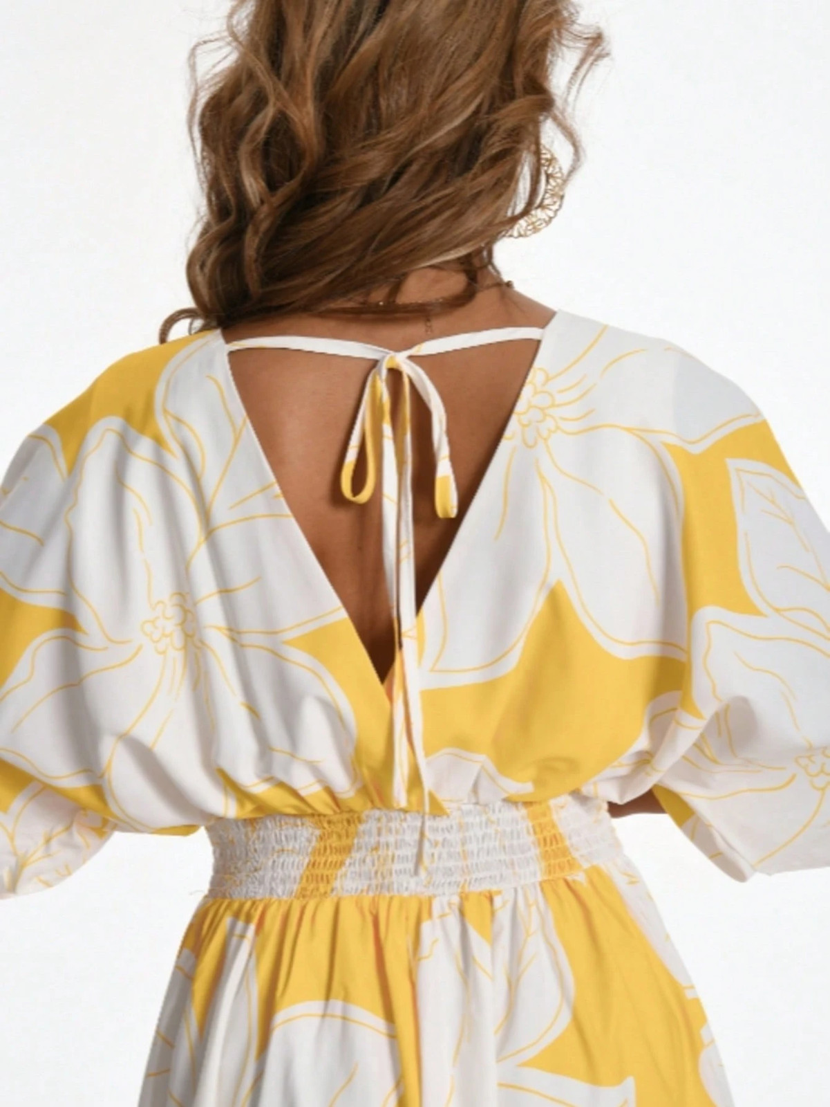 Elegant long dress with all over pattern in yellow