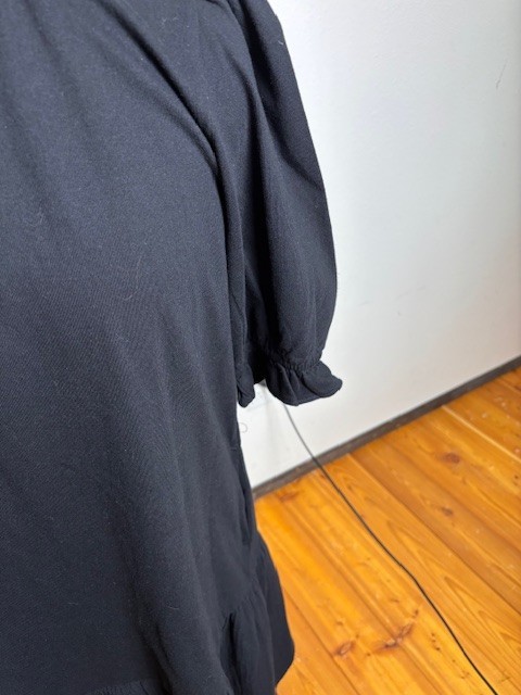 Solid black Caslon dress large cotton with button back closure, ruffled skirt
