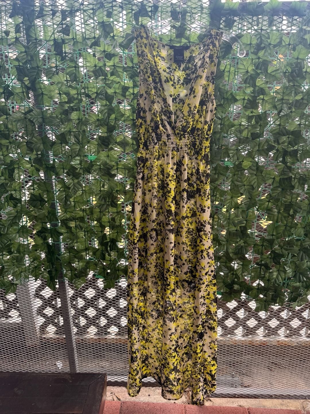 Vertigo Paris Sleeveless V-Neck Floral Maxi Dress in Yellow and Black