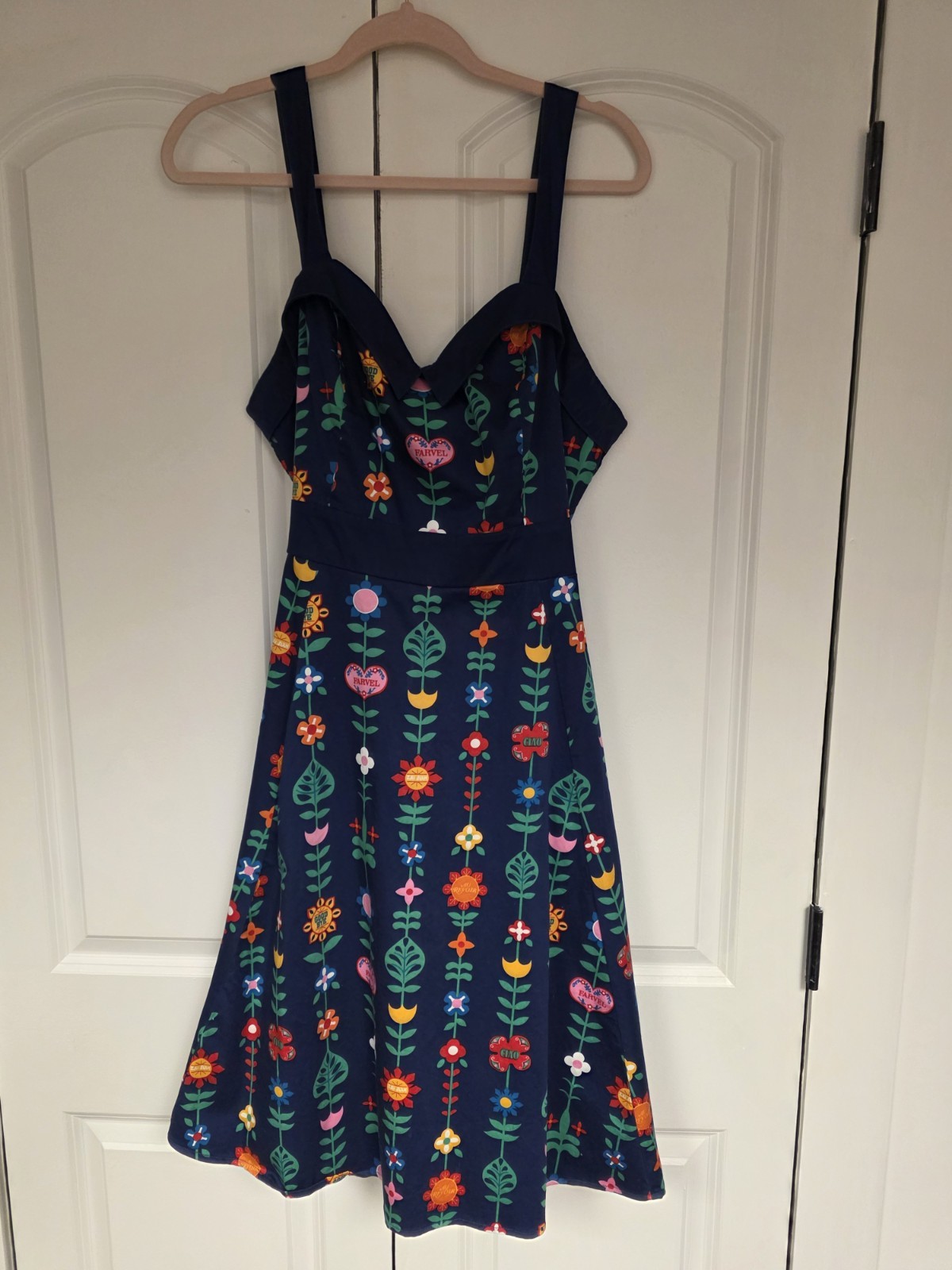 Disney Parks women’s ‘It’s a small world” Tie Dress