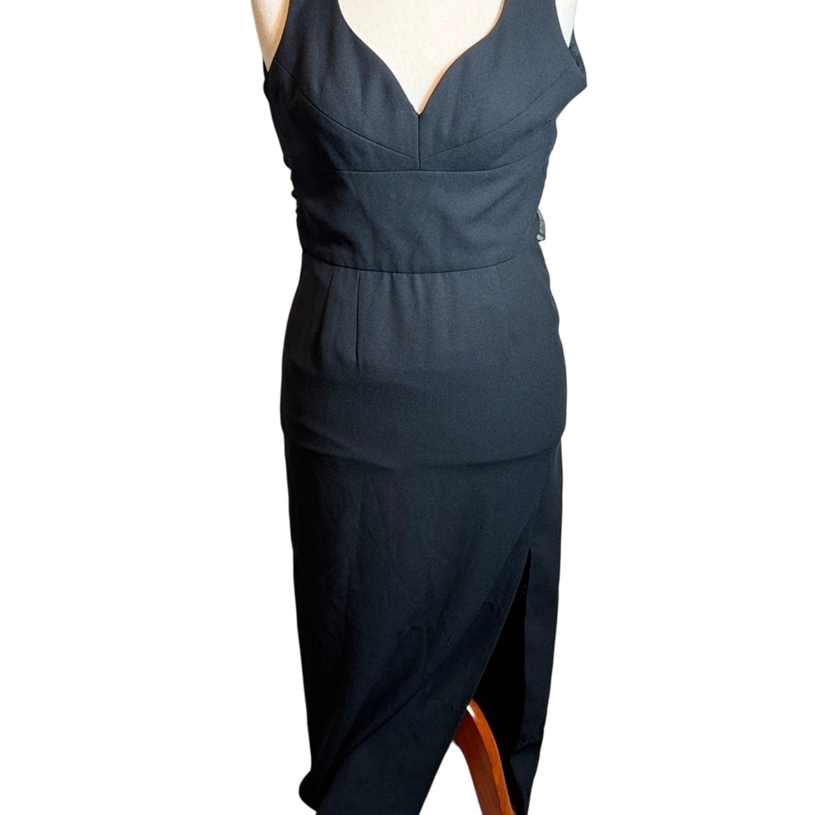 Gillian black formal dress long deep open neckline & bow at back and slit Sz 10