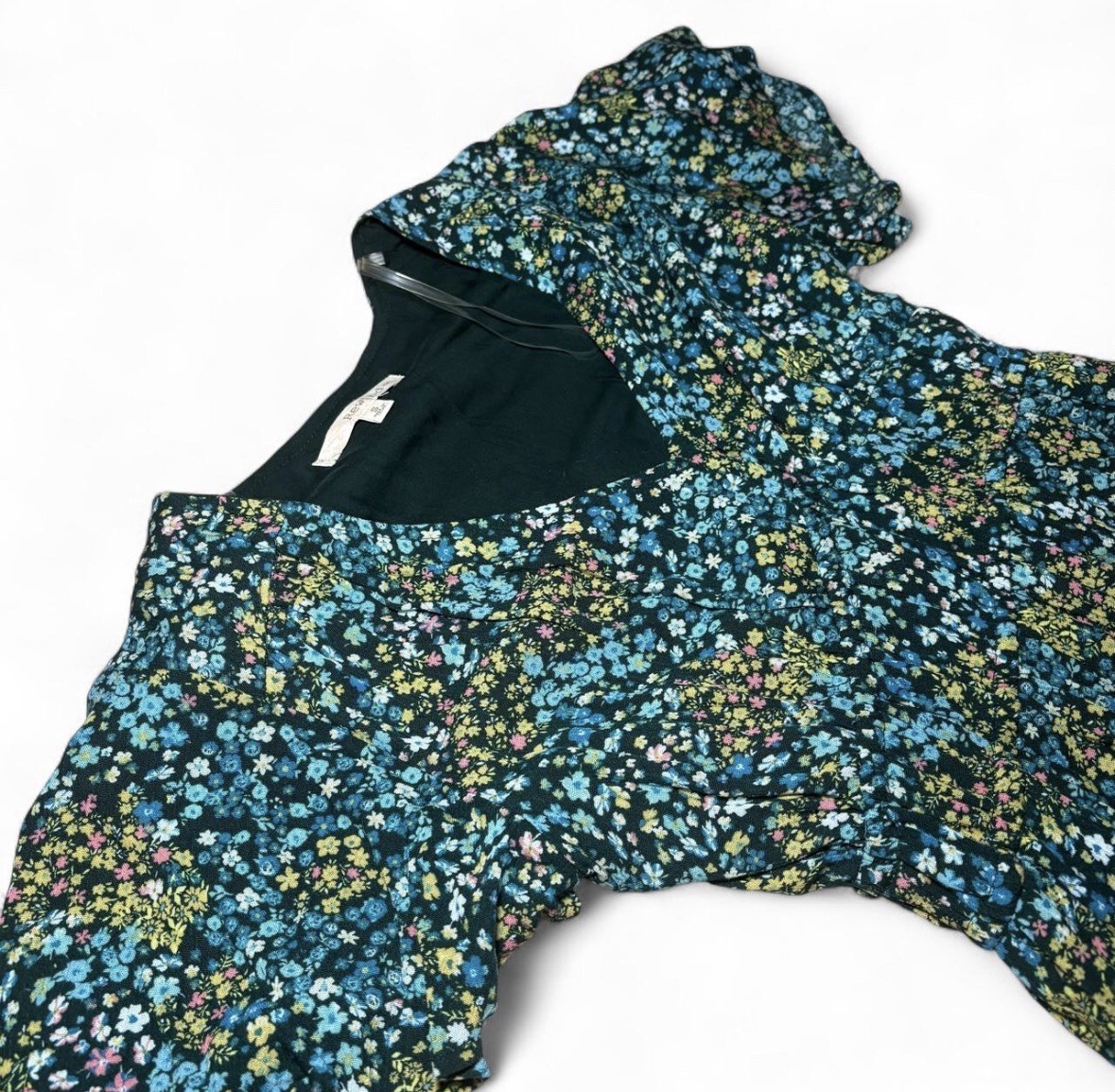 Rewind blue/green floral mini dress with ruffle hem. Size: Small