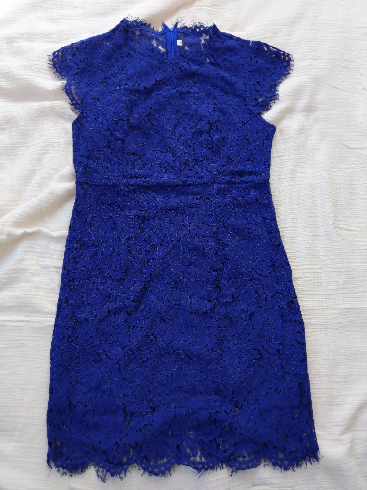 Women’s blue lacy dress size XL waist measues about 32 inches. sz 10/12
