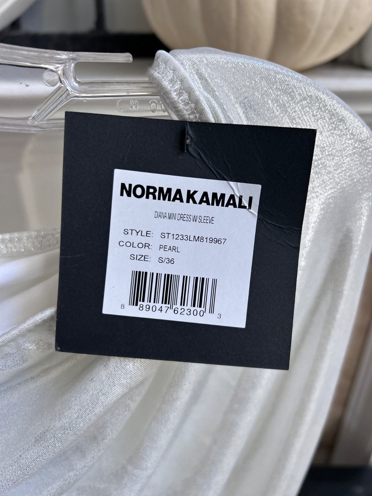 NWT $245 NORMA KAMALI” Diana” mini dress w/ one shoulder cape sleeve – Pearl – S