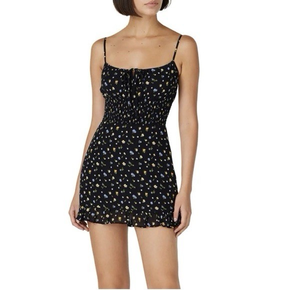 Reformation Floral mini dress Size 6 Black, Fully Lined, Ruffle Hem, Zipper