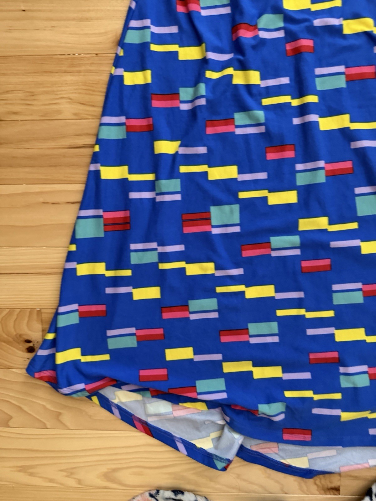 LuLaRoe Carly swing dress featuring a vibrant, multi-colored geometric block XL
