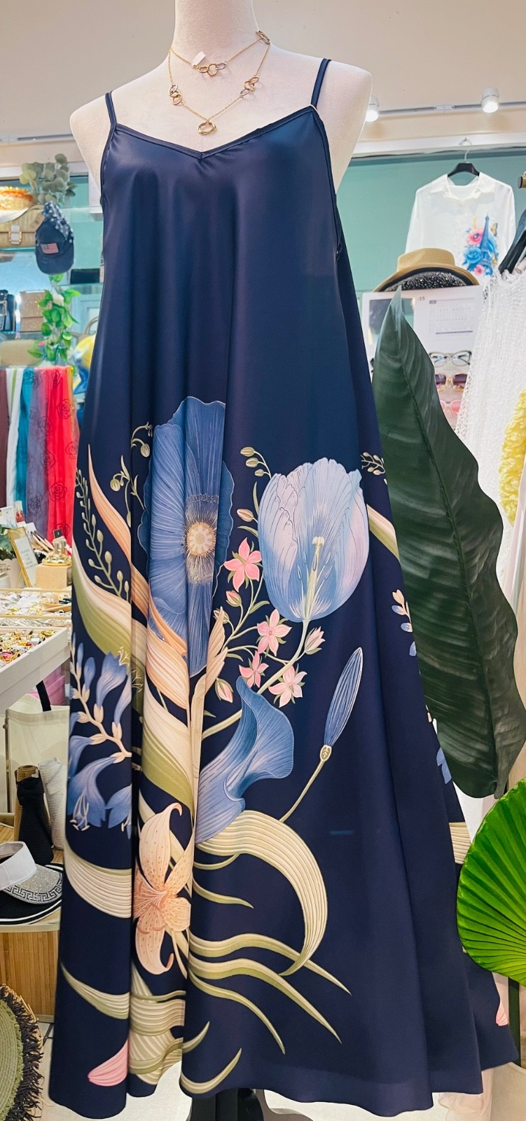 Maxi dress, 30 % silk, 70% viscose, made in Italy.