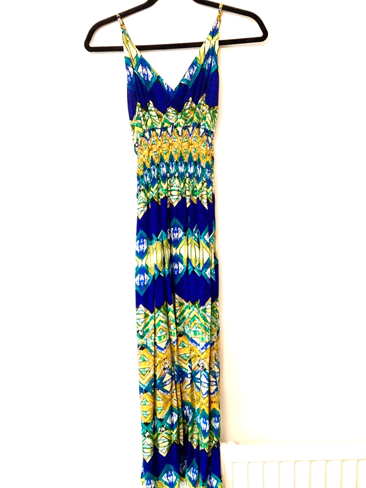 Stunning blue maxi dress featuring a vibrant geometric Aztec