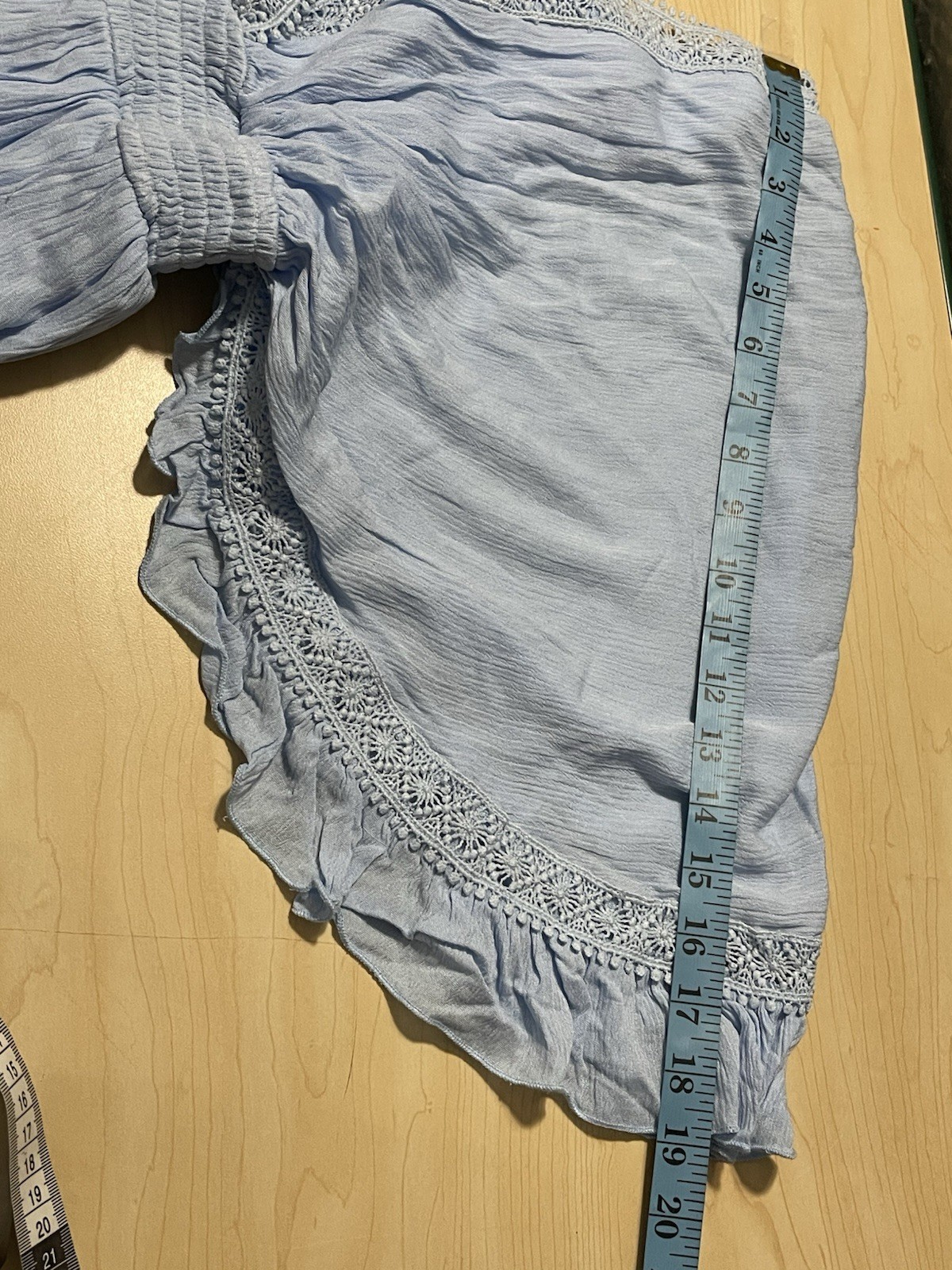 2 women’s dresses: one light blue Shero (size S, wide sleeves) and one white