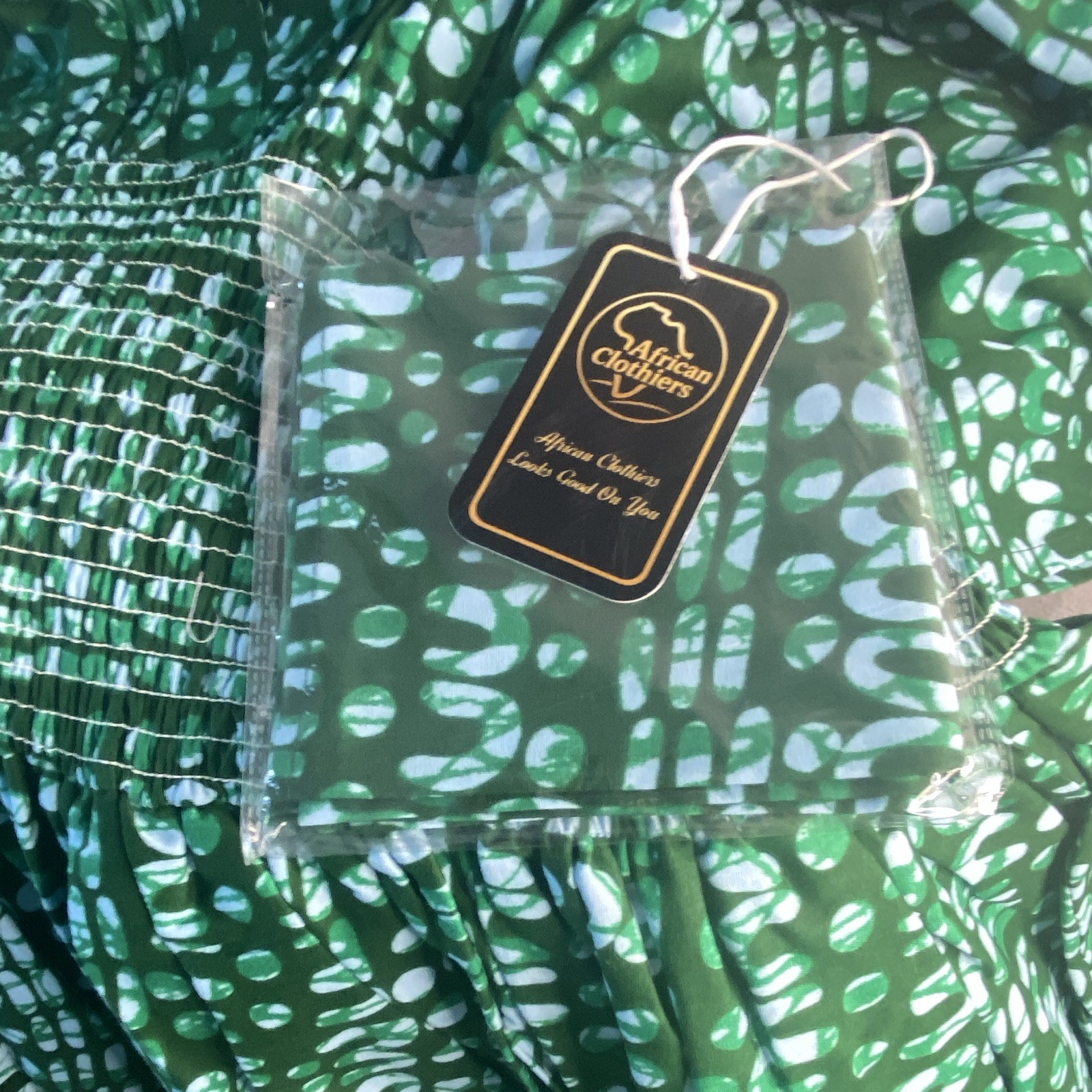 African Clothiers Green White Abstract Smocked Tiered Tie V-Neck Mini Dress