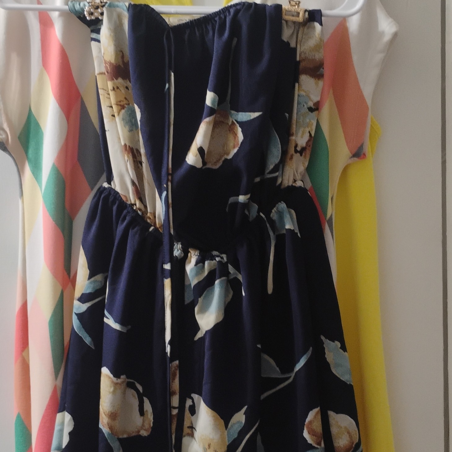 3 items for 25 all M 2 dresses 1 floral shorts romper