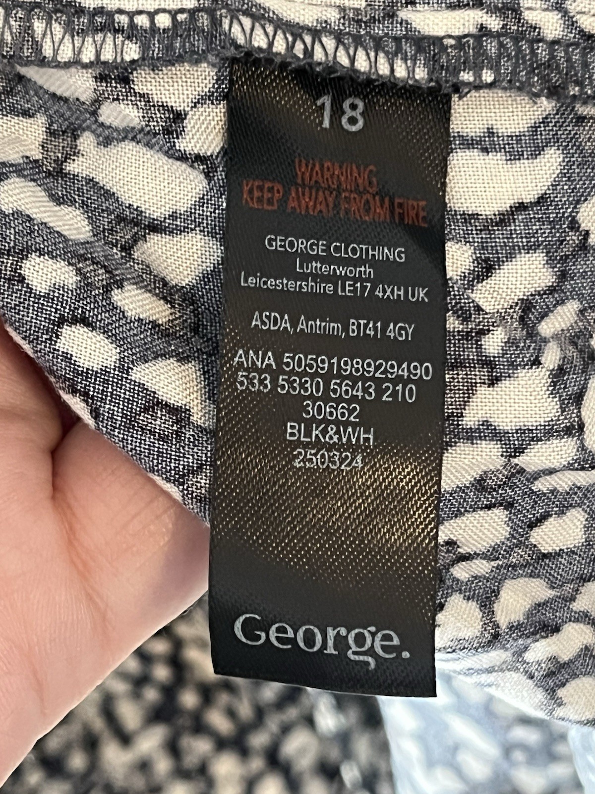 George Button Through Dress, abstract animal print and a ruffled hem. Size 18