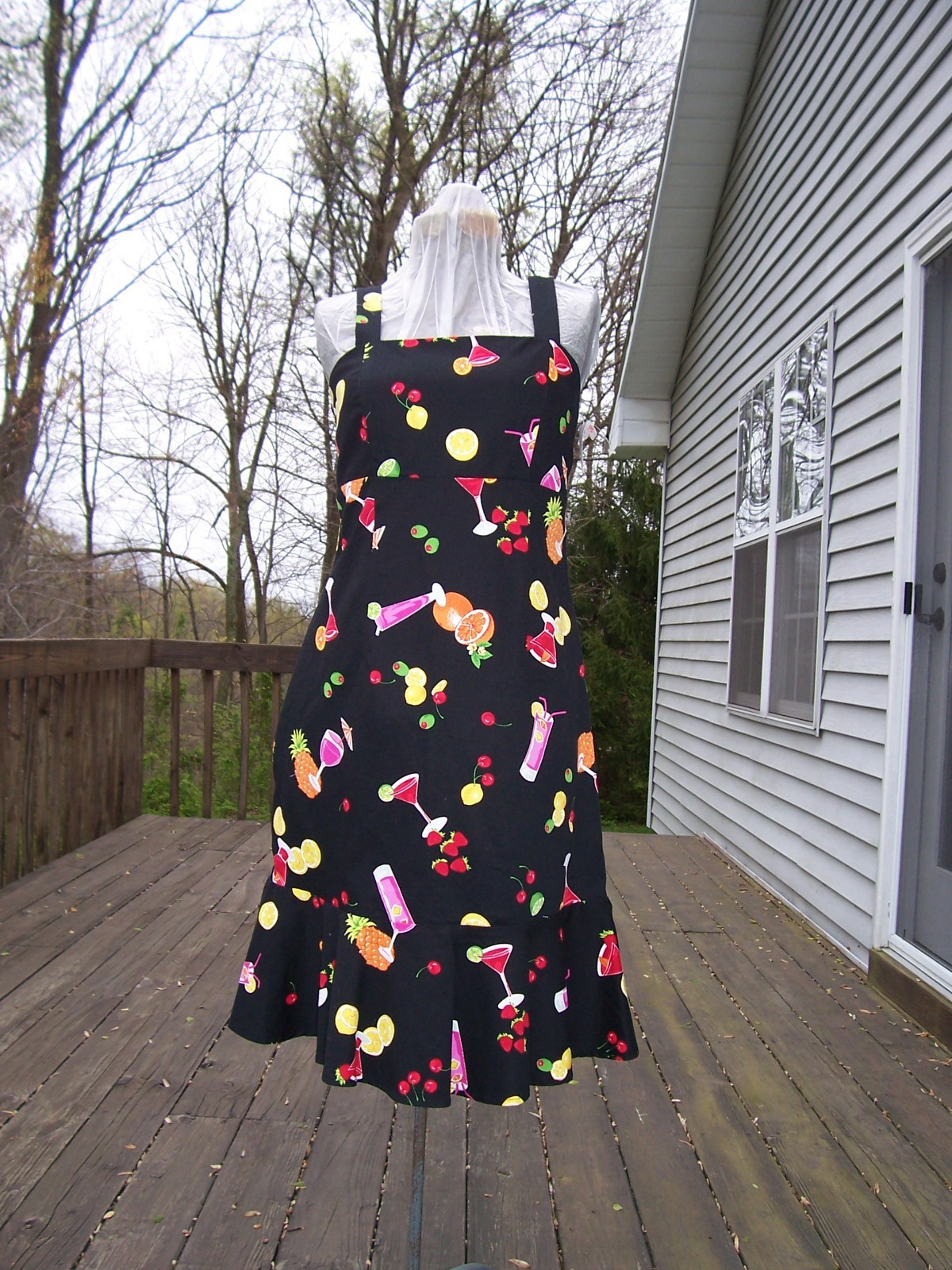Black Sundress with Colorful Flare Cute dress with fun fruit and cocktail motif.