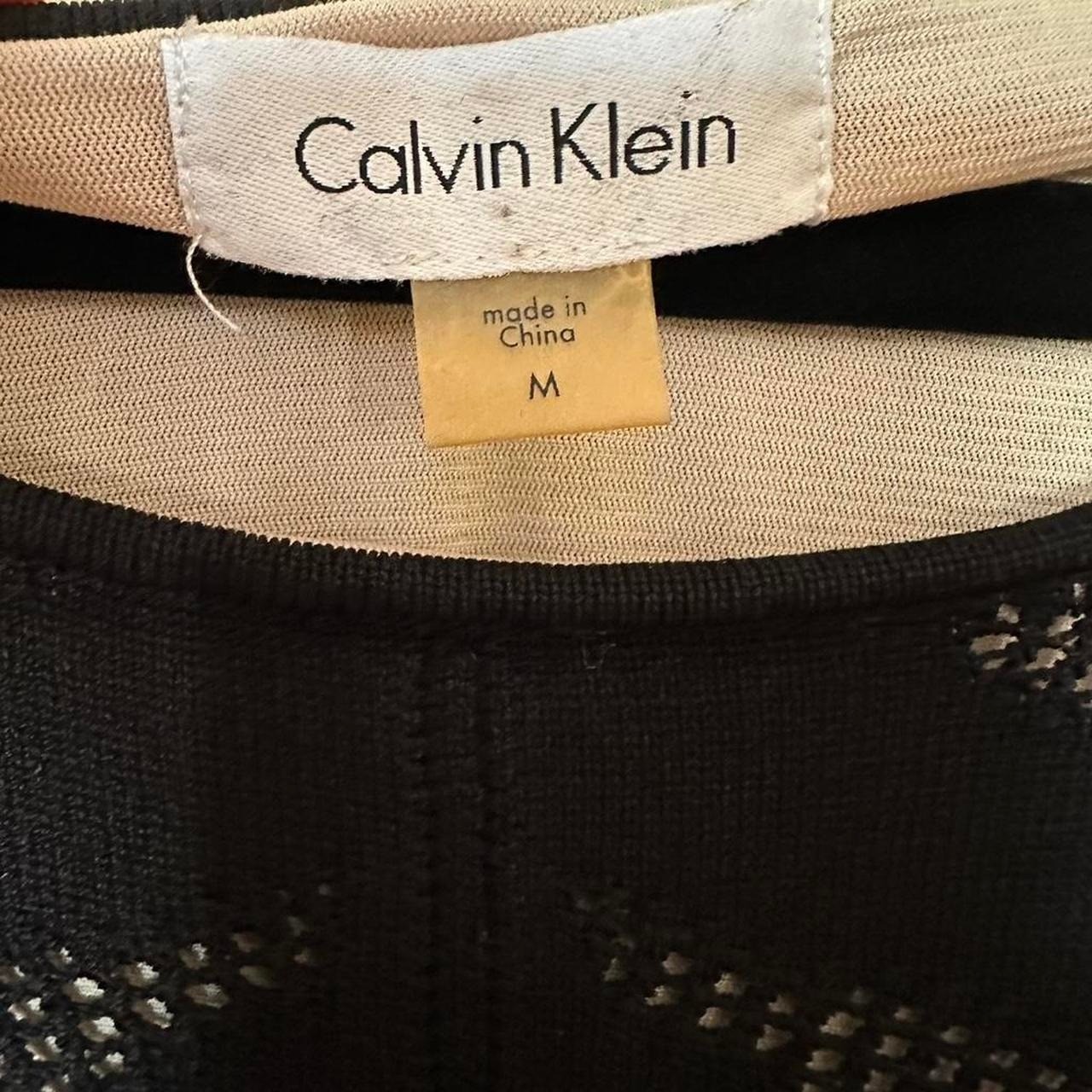 Calvin Klein black fishnet dress with nude lining. Body con, cocktail,