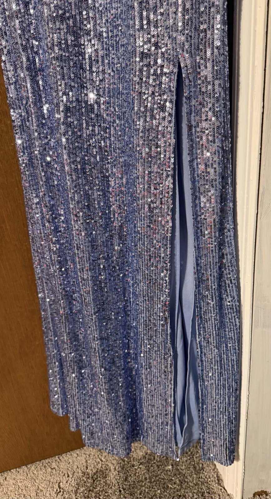 NWT Blue sequin spaghetti strap V-neckline low back, and a high slit Never worn
